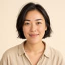 Profile photo on an example babysitter card: a young woman smiling at the camera.
